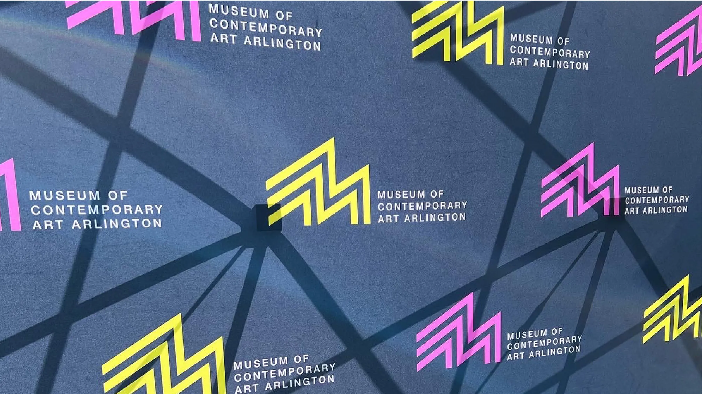 MoCA Arlington step-and-repeat banner